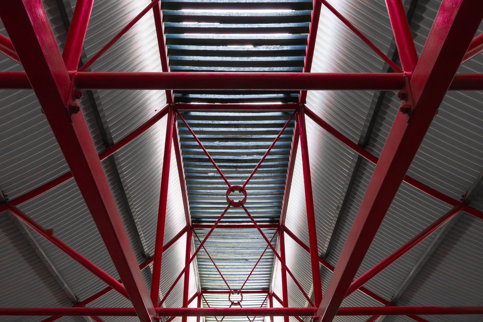 Exposed structural steel roof framing in an industrial building